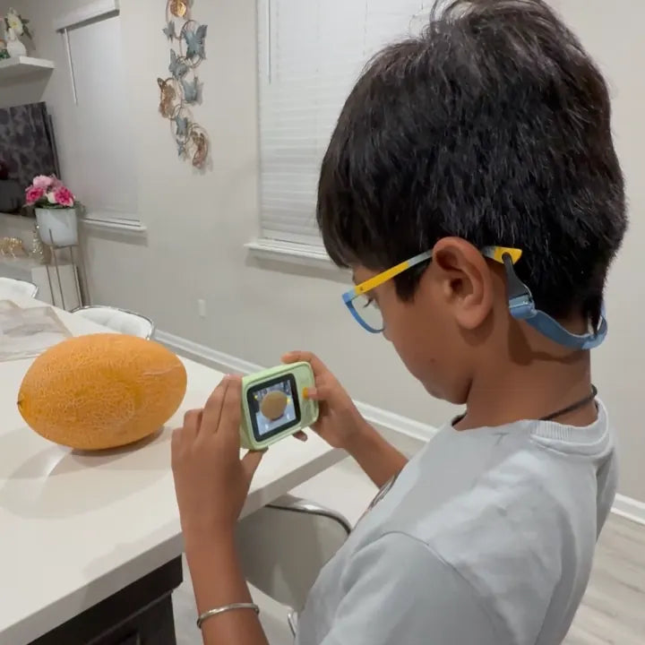 Child independently exploring with Dr.Look AI Cap
